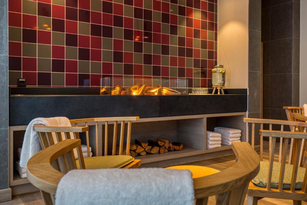 Intercityhotel Berlin Airport Ber Terminal 1 & 2 Шёнефельд Экстерьер фото "The fireplace is a highlight of the spa."